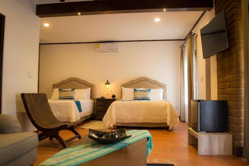 Casa De Adobe Gallery & Luxury Boutique Oaxaca Kamer foto
